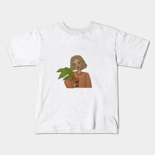 girl holding a plant Kids T-Shirt